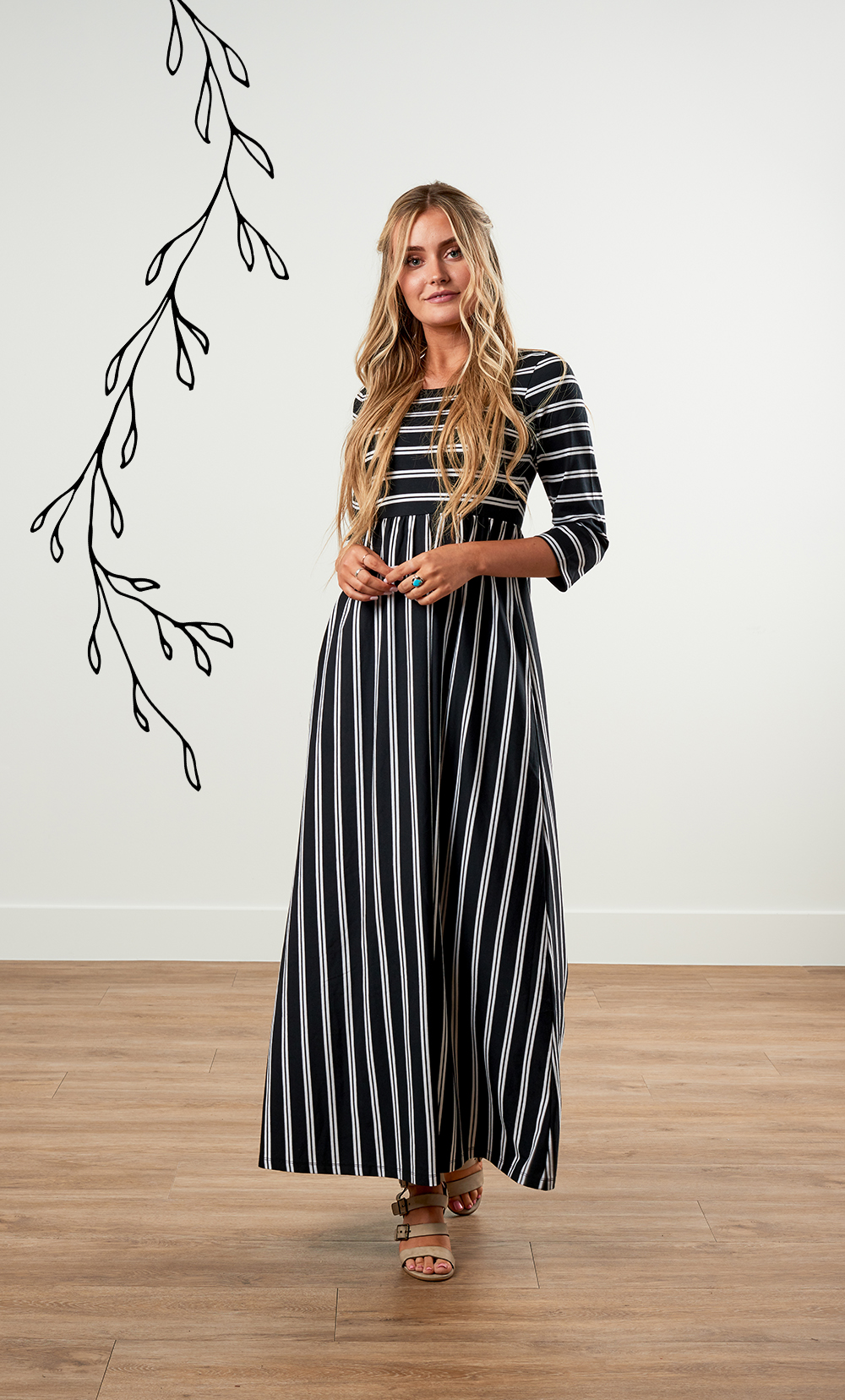 Woman in striped maxi dress