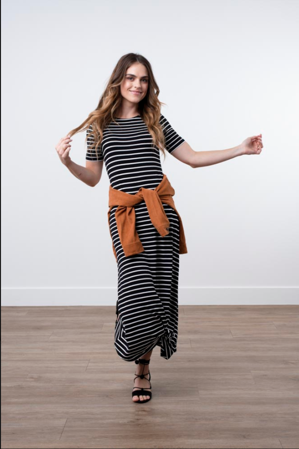 Woman in striped midi dress