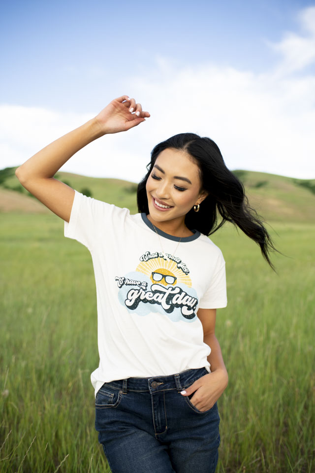 Girl in Knee Length Denim Shorts and a Crew Neck Tee