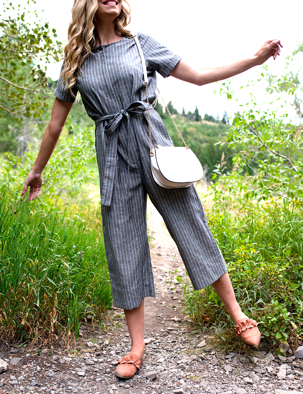Woman on trail wearing a modest jumpsuit